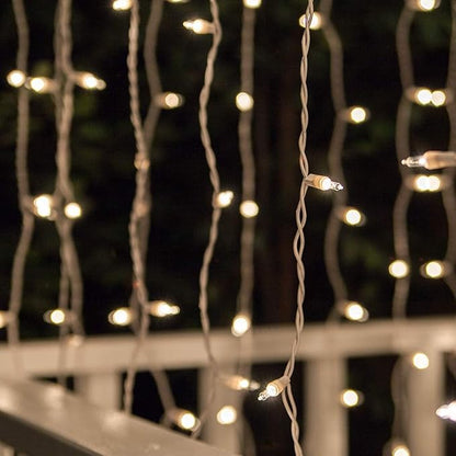 Kringle Traditions 150 Clear Incandescent Curtain Icicle Lights, 5.5' String Lights for Bedroom, Indoor/Outdoor Use